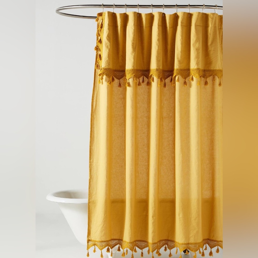 Anthropologie Tasseled Antioch shower curtain in the color Mustard